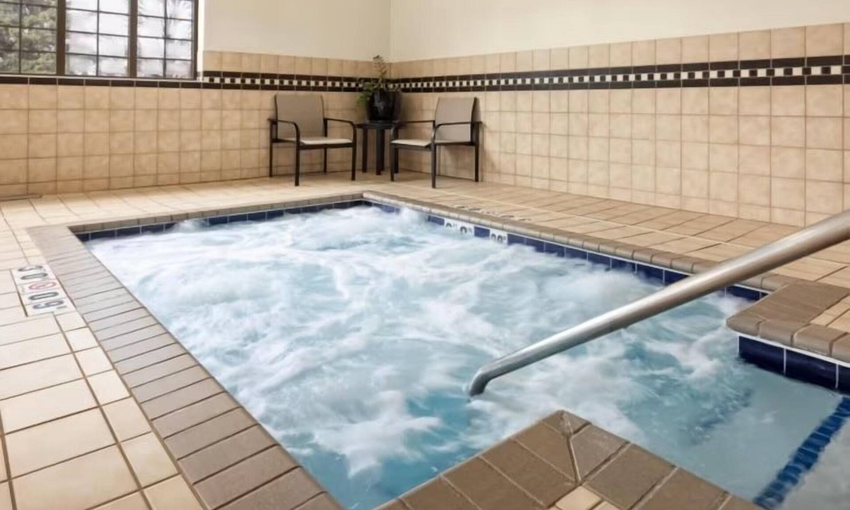 West Bloomington Apartment | Free Breakfast. Pool & Hot Tub. Great for Business Travelers!