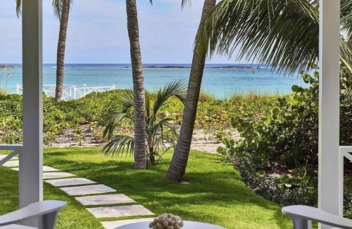 Governor's Harbour Villa | Immerse in Beachfront Bliss: Cottage with Veranda Overlooking Pink Sands