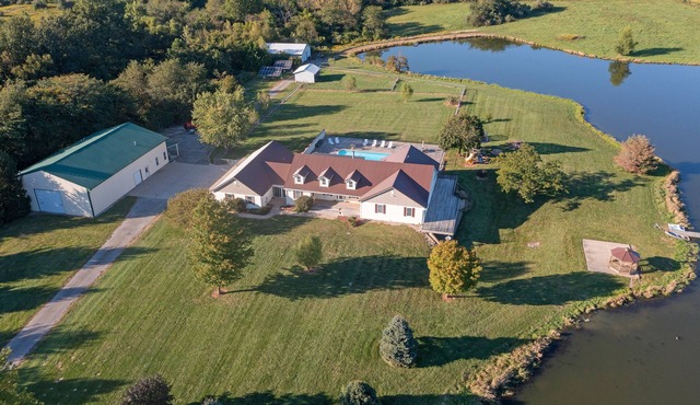 Beautiful Country Setting with Heated Inground Pool and Stocked Pond in Dawson