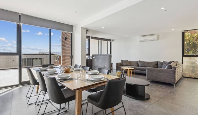Chilam C embraces open plan living with a combined kitchen/dining/living area in Jindabyne