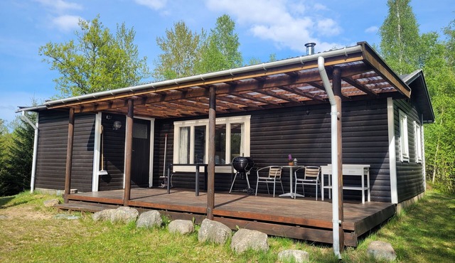 Cozy vacation home with fireplace, close to lake and sea and with rowing boat in Laholm