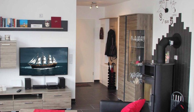 ECARF certified vacation apartment Meeresrauschen 12 in Großenbrode. Maximum living comfort with TV recliner, underfloor heating, rain shower & sauna. Modern entertainment electronics with Sony PS3 in Großenbrode
