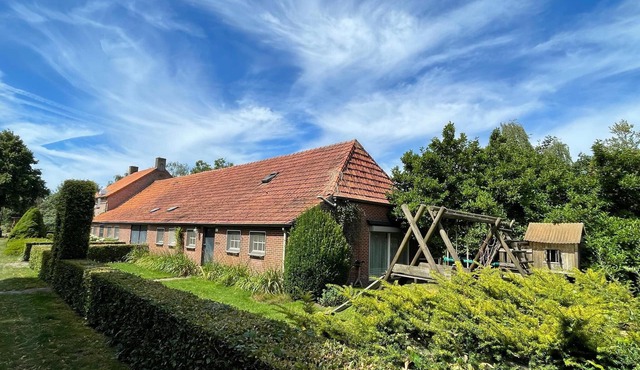 Family Farmhouse with go-karts in Uden