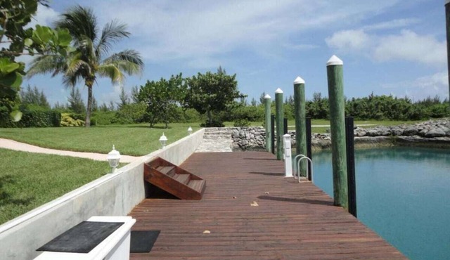 Green House With Dock in West End Bahamas Old Bahama Day in West End