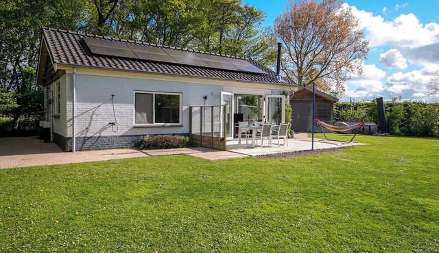 Ground-floor holiday home in Poldersbos, quietly located with a spacious garden near the beach and nature. in Ouddorp
