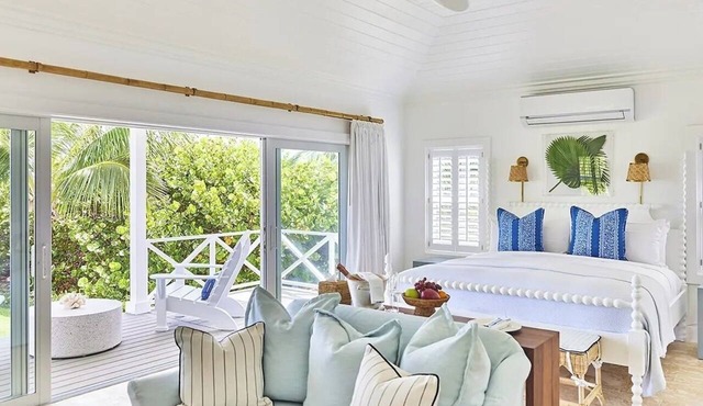 Immerse in Beachfront Bliss: Cottage with Veranda Overlooking Pink Sands in Governor's Harbour