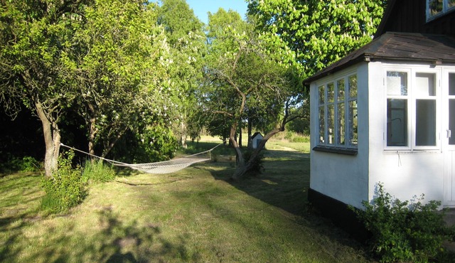 Tastefully decorated Skåne meadow in nature reserve near the sea in Löderup