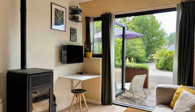 Tiny house with fireplace in polder | Tiny House Gold in Groede