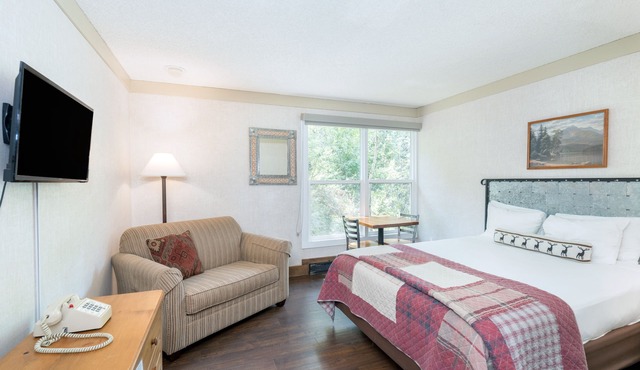 Updated Hotel Room With Kitchenette, Seating Area at the Mountainside Inn in Telluride