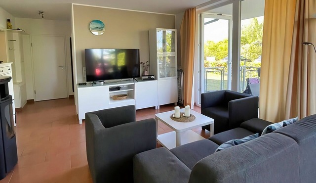 Vacation apartment Sonnenschein 17 in Großenbrode. Bed + Bike certified. Cozy feel-good atmosphere with sauna, underfloor heating & wood-burning stove. Windbreak, beach chairs & selection of beach toys included in Großenbrode