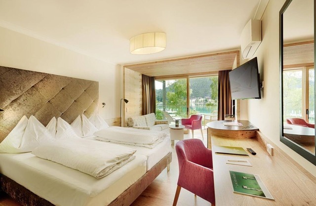 Junior Suite 'Fidelio' HP - Amerika-Holzer Hotel Resort in Klopein