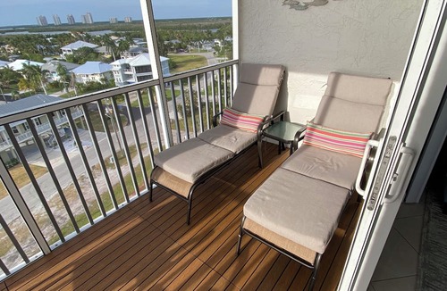 Bonita Springs Condo | Spectacular 9th Floor Views and Sunsets! Steps to the beach. Free in suite WiFi.